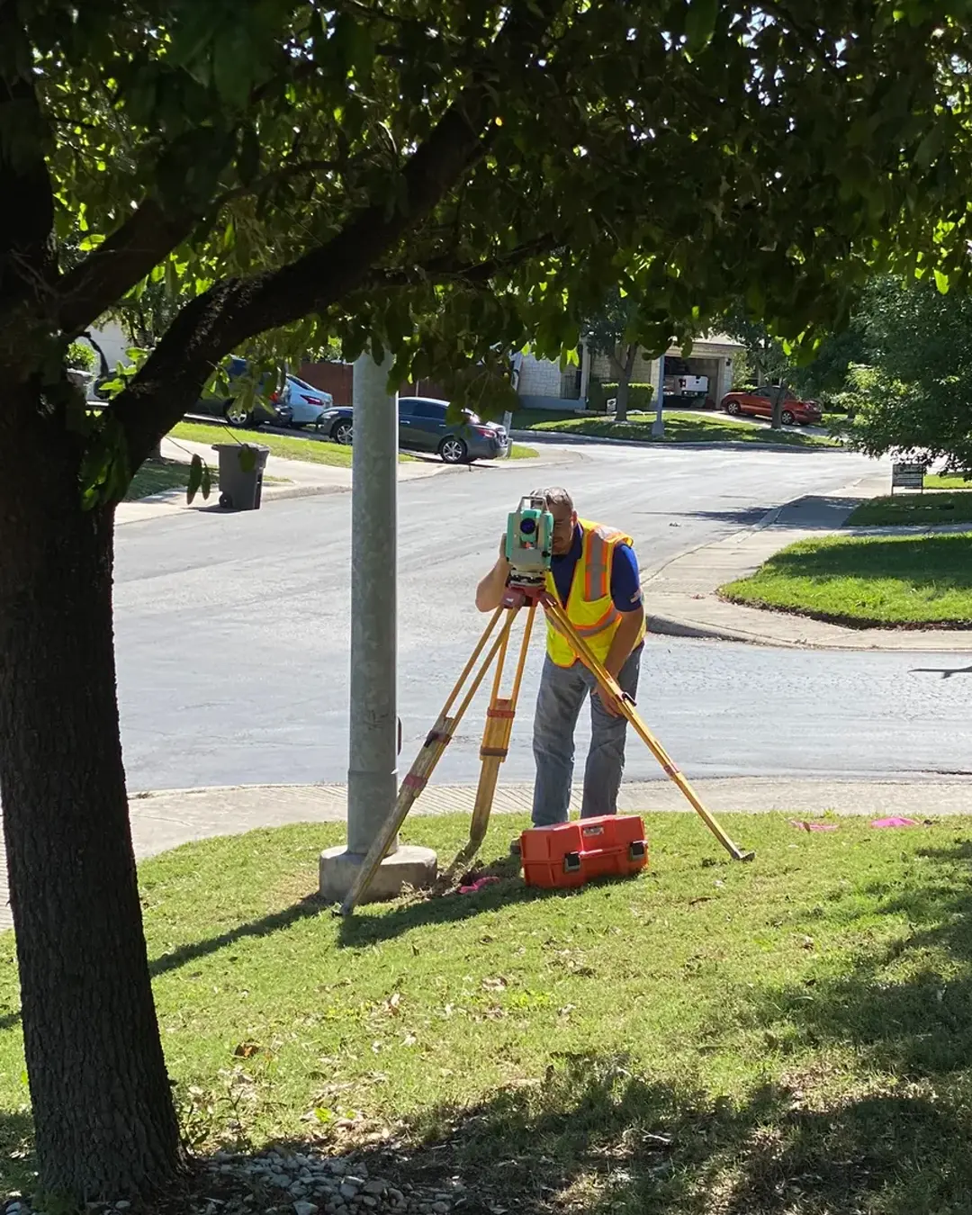 Eric Speece operating a total station during active field surveying