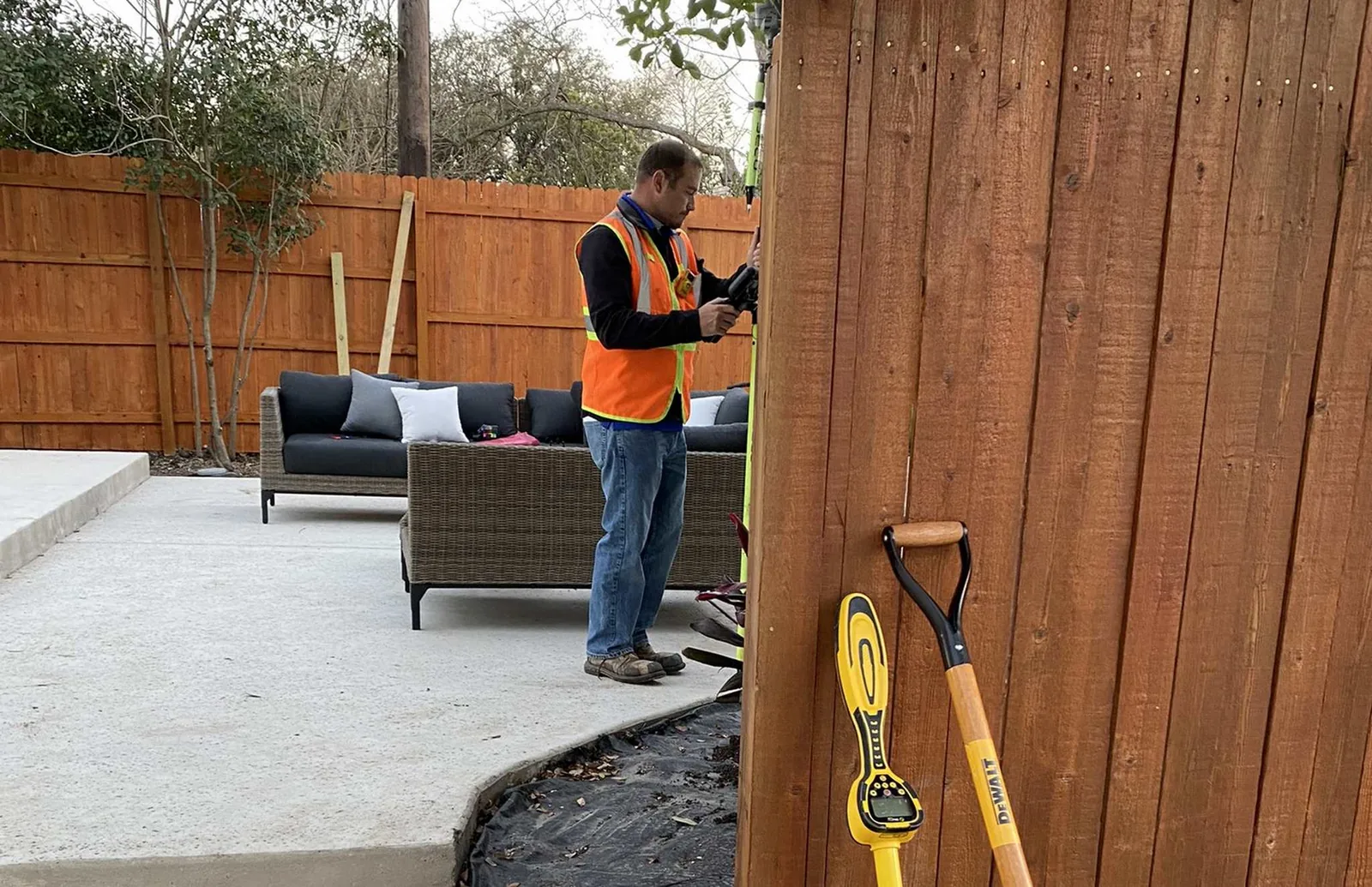 Surveyor reviewing a property for title and due diligence support